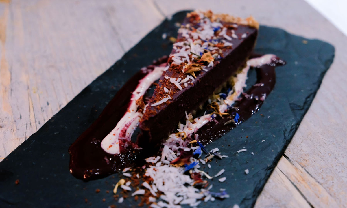 Chocolate dessert slice with coconut flakes — serving inspiration