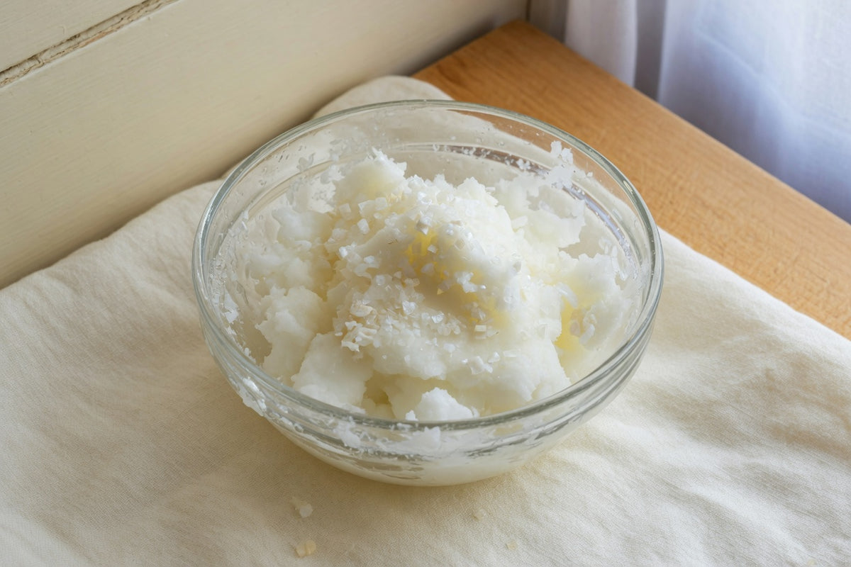 Organic extra virgin coconut oil showing its naturally solid white texture
