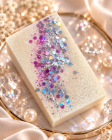 Frosted Rhubarb and Rose colloidal silver soap on marble with pink and iridescent glitter