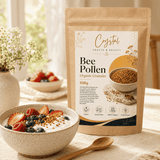 Organic bee pollen granules sprinkled over yoghurt and berries beside the 500g pouch
